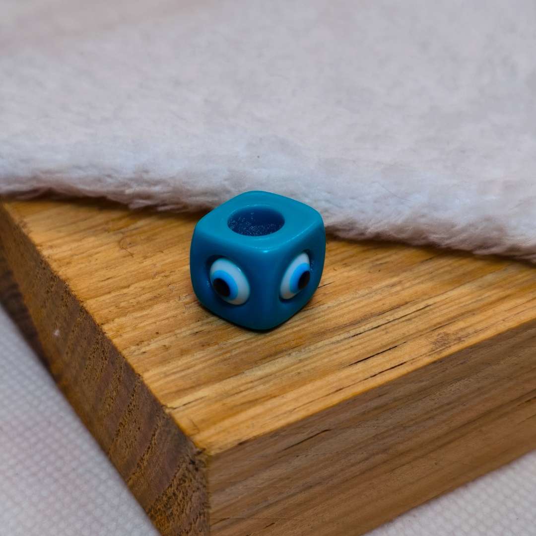 Pasador Acrilico Cubo Ojo Turco 12 mm  -  Paquete de 1 Unidades