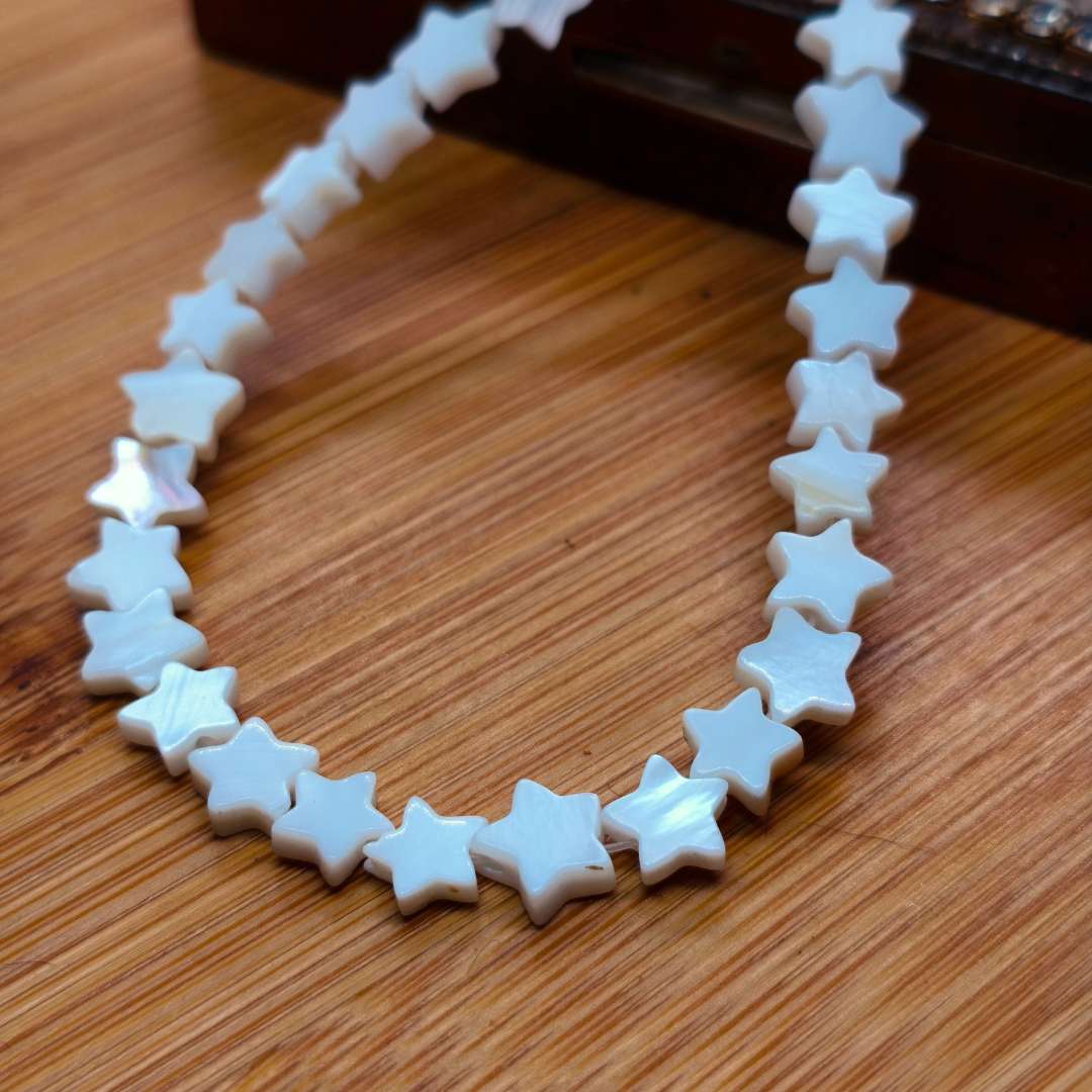 Pasador Nacar Estrella 07 mm  -  Tira de 60 Unidades